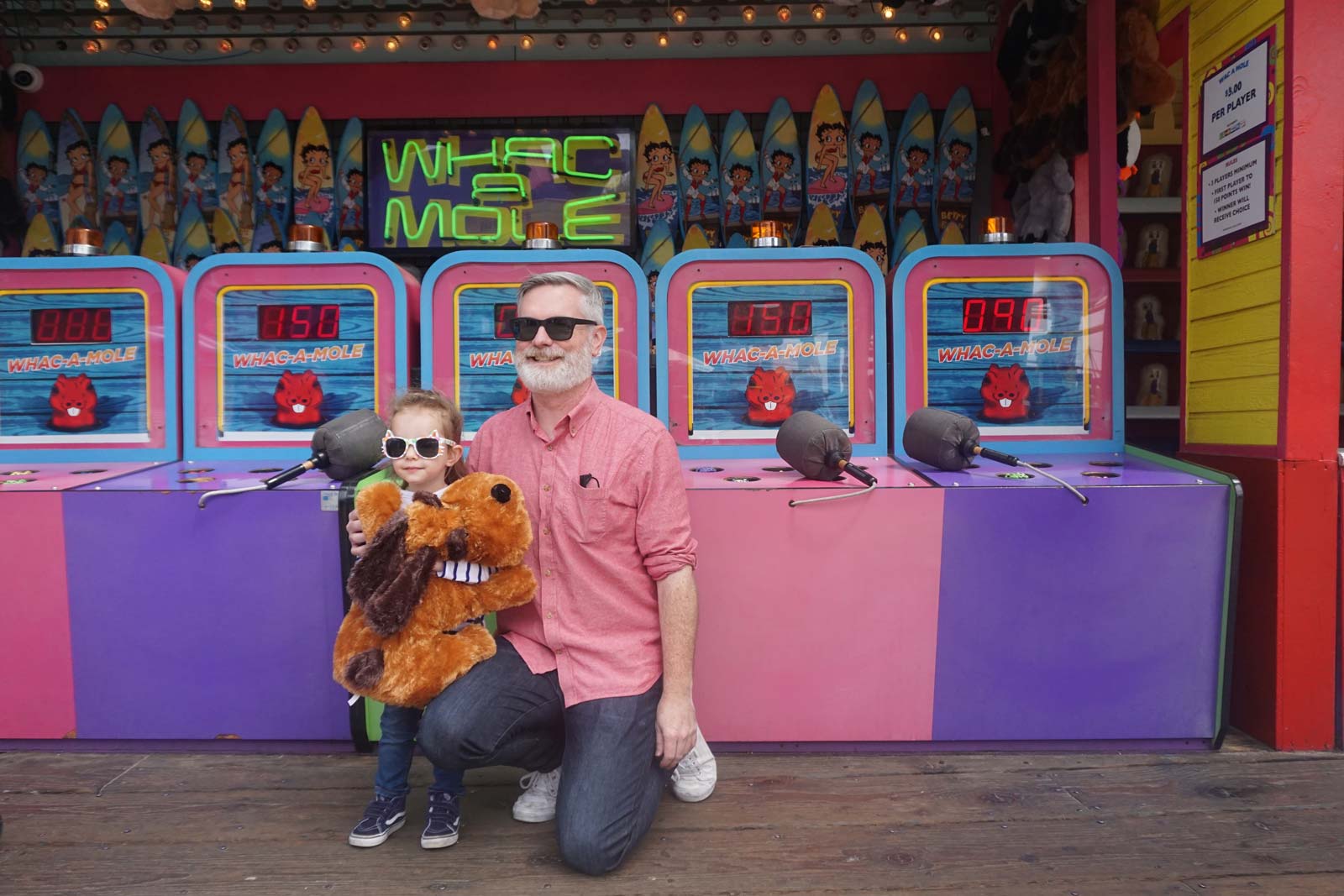 Brendan having just won the carnival game known as Wac-A-Mole